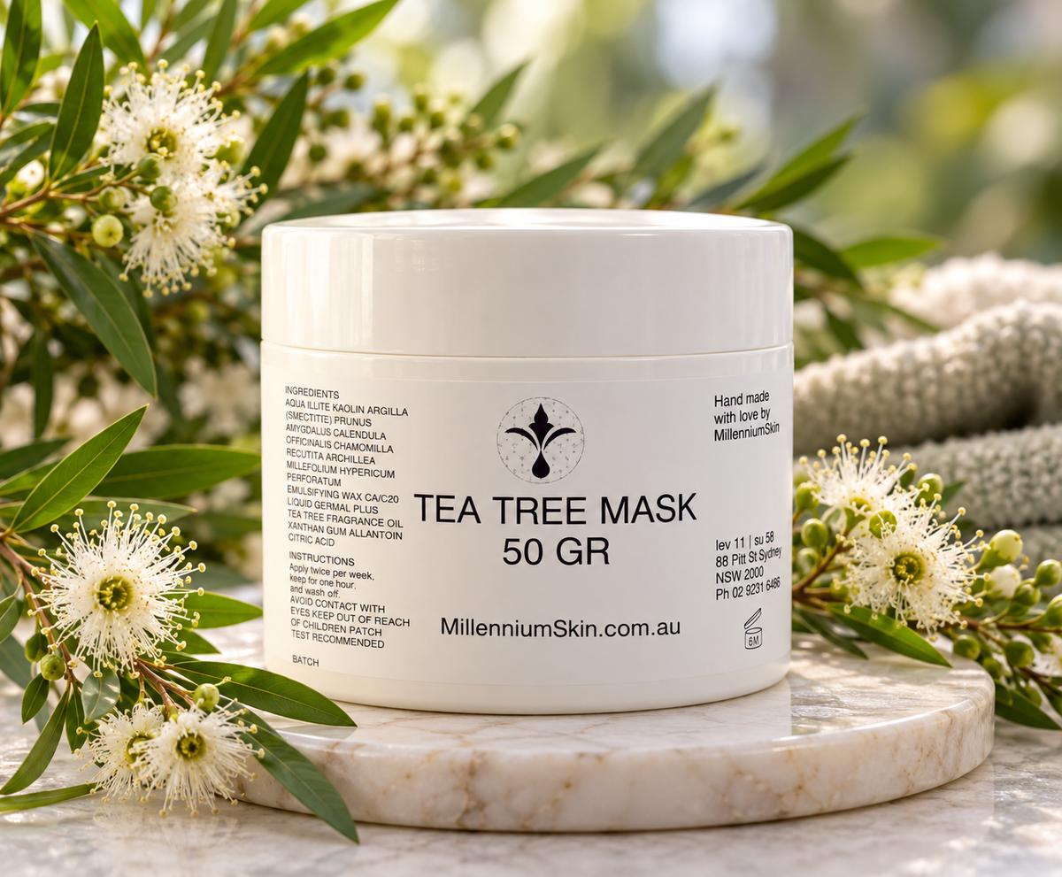Millennium Skin Tea Tree Mask 50g jar with botanical foliage and white flowers
